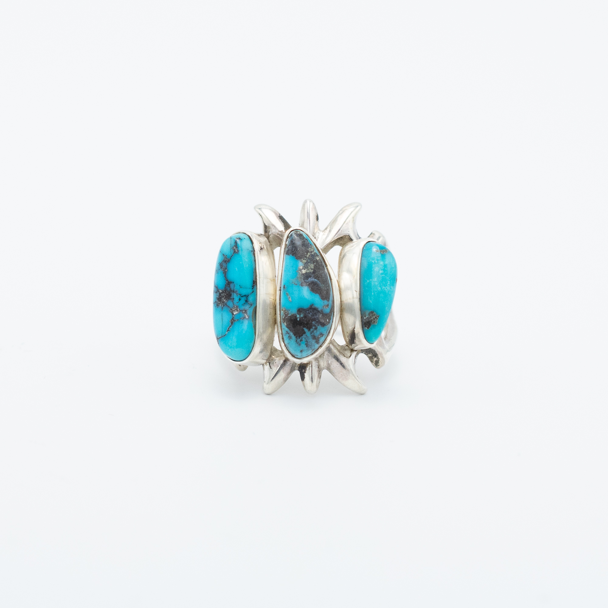 Kingman and Morenci Turquoise Ring by Navajo artist FL Begay - bold sculptural sterling silver design with three natural turquoise stones, size 9