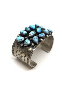 Handcrafted sterling silver turquoise cluster cuff bracelet featuring natural cabochons made by artist Jimmy Gutto